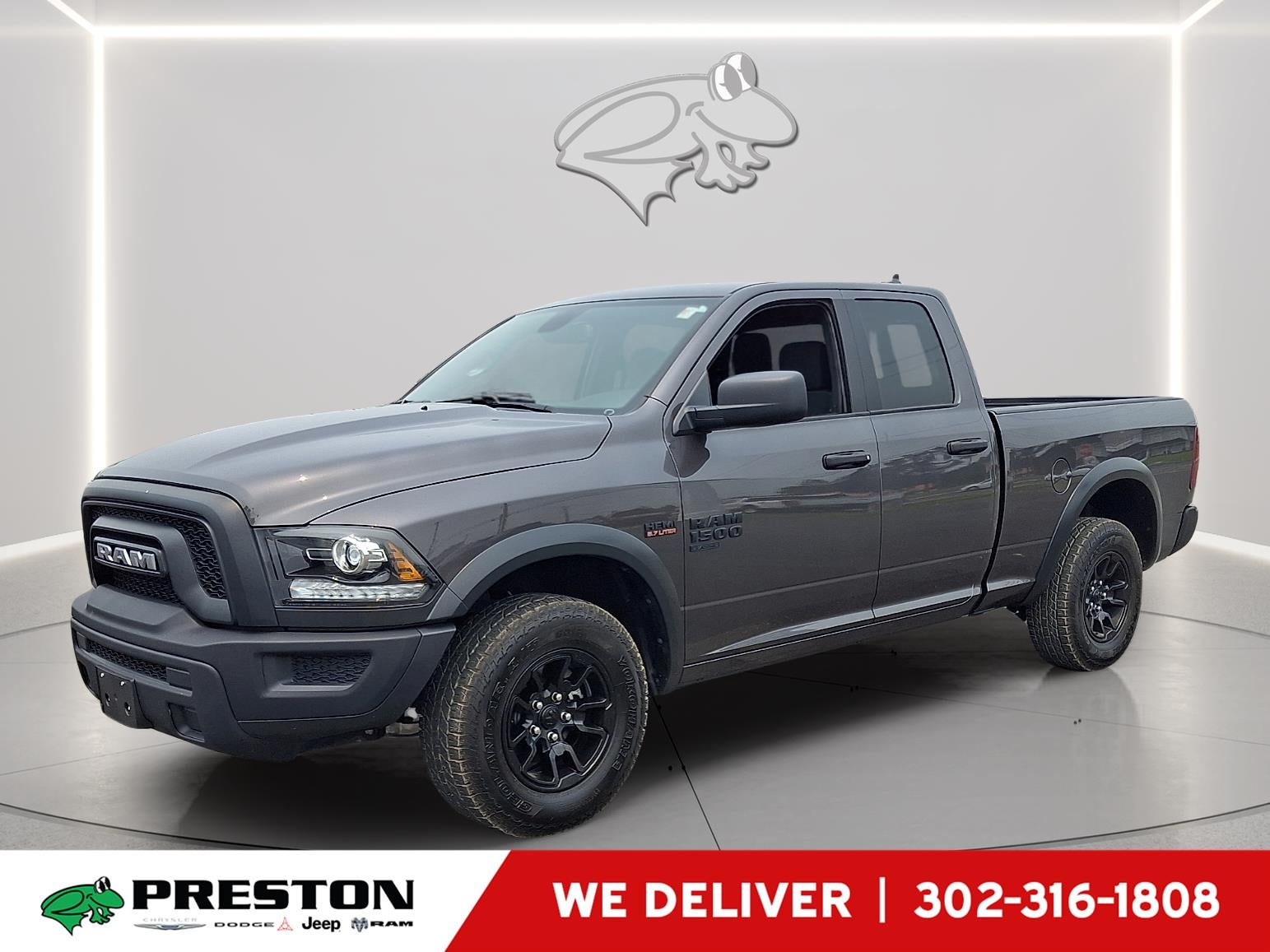 2024 RAM 1500 Classic Warlock in Granite Crystal Metallic Clearcoat — front three-quarter view