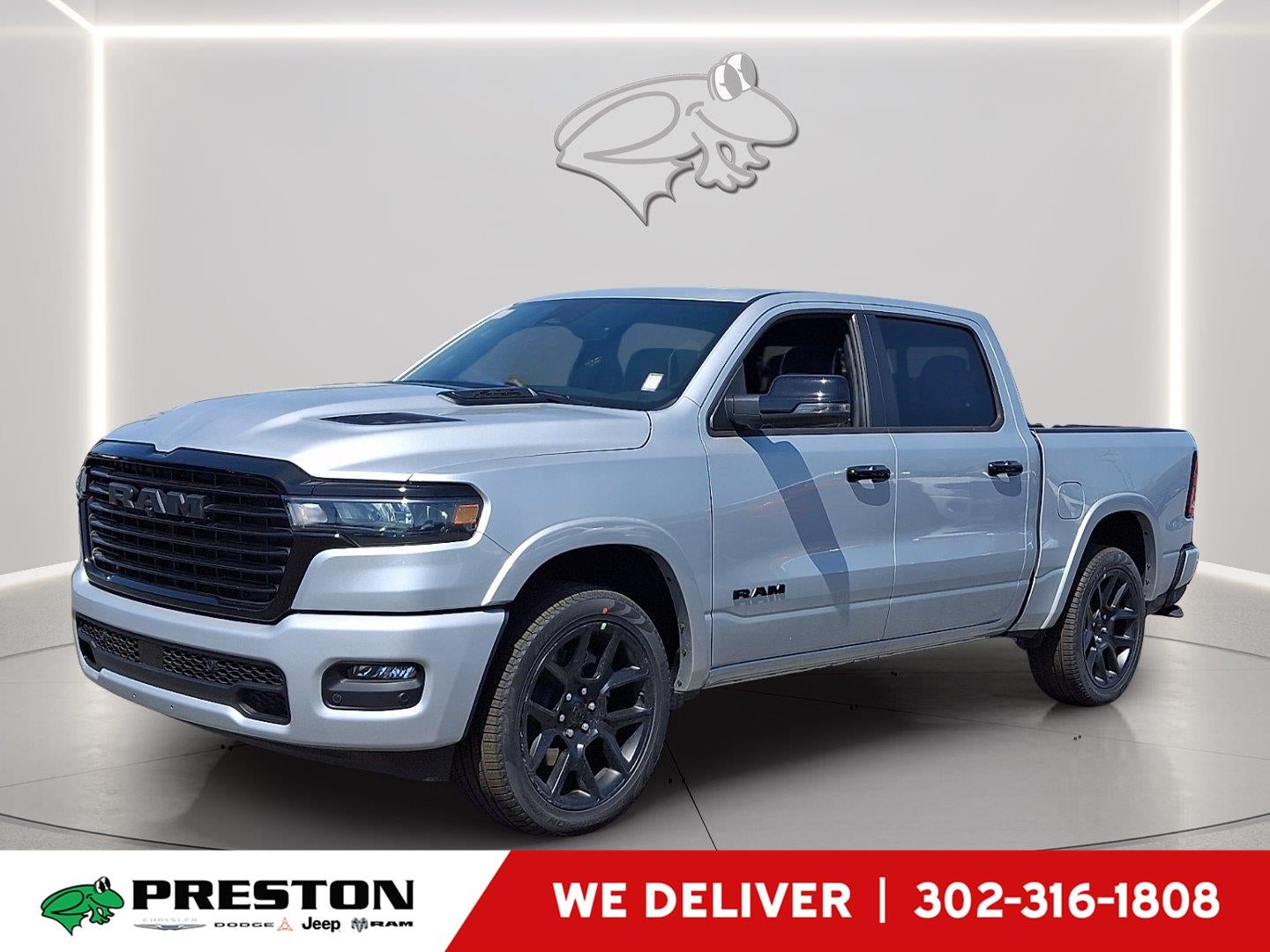 2026 RAM 1500 Laramie in Silver Zynith — front three-quarter view
