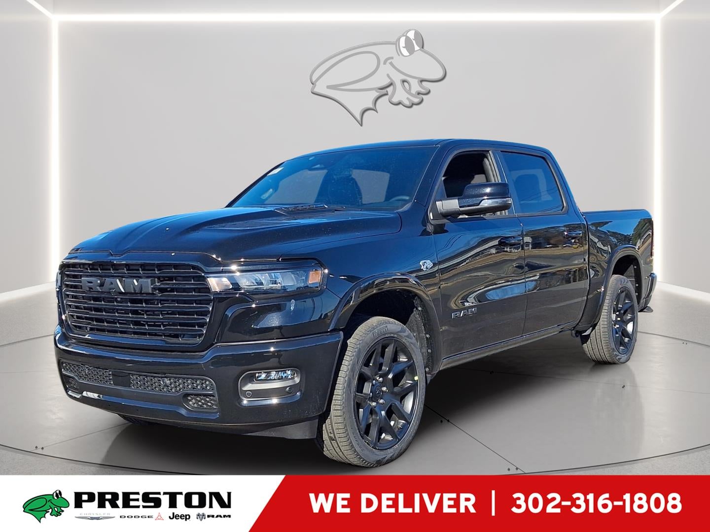 2026 RAM 1500 Laramie in Diamond Black Crystal Pearlcoat — front three-quarter view
