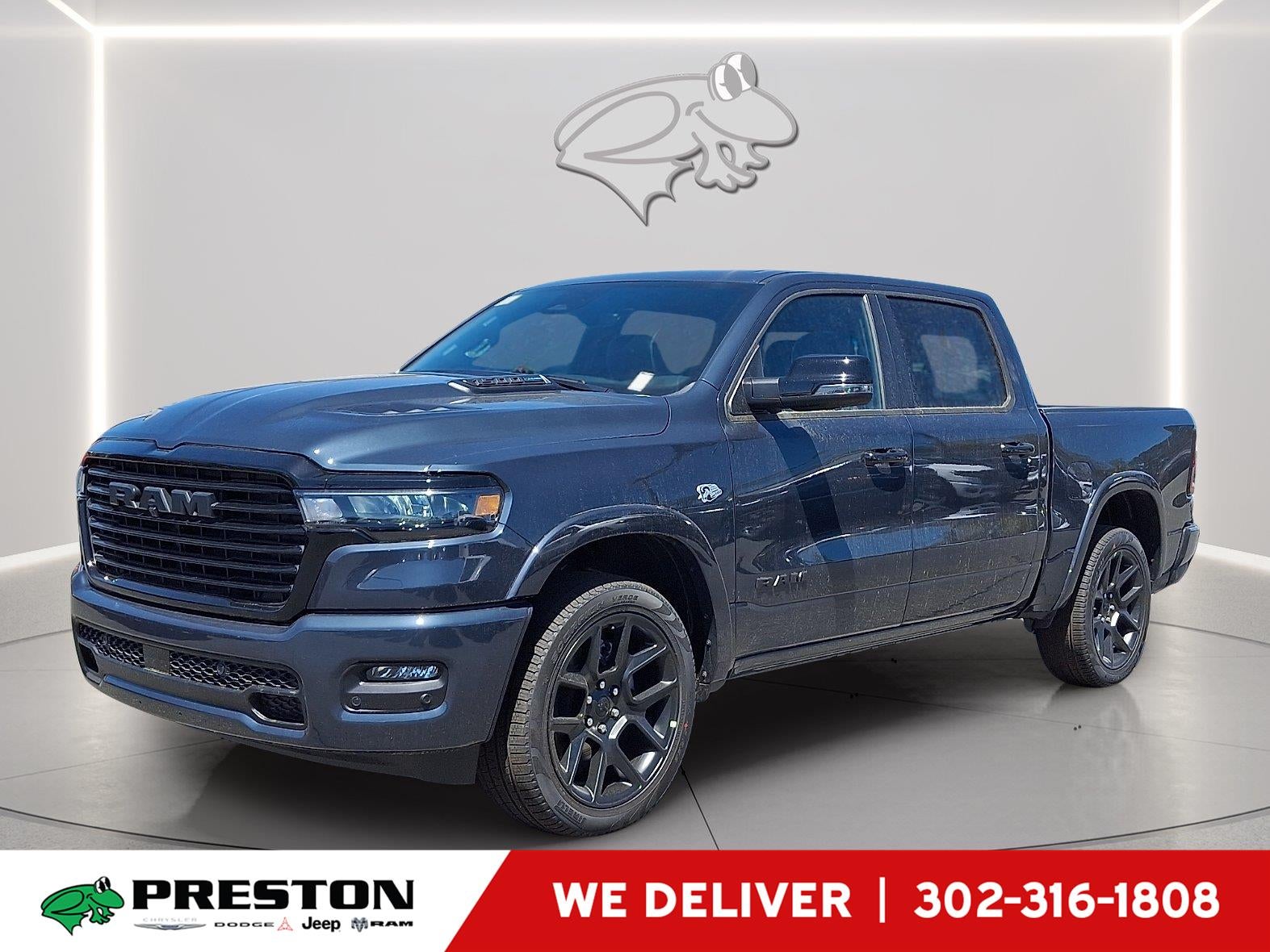 2026 RAM 1500 Laramie in Forged Blue Metallic — front three-quarter view
