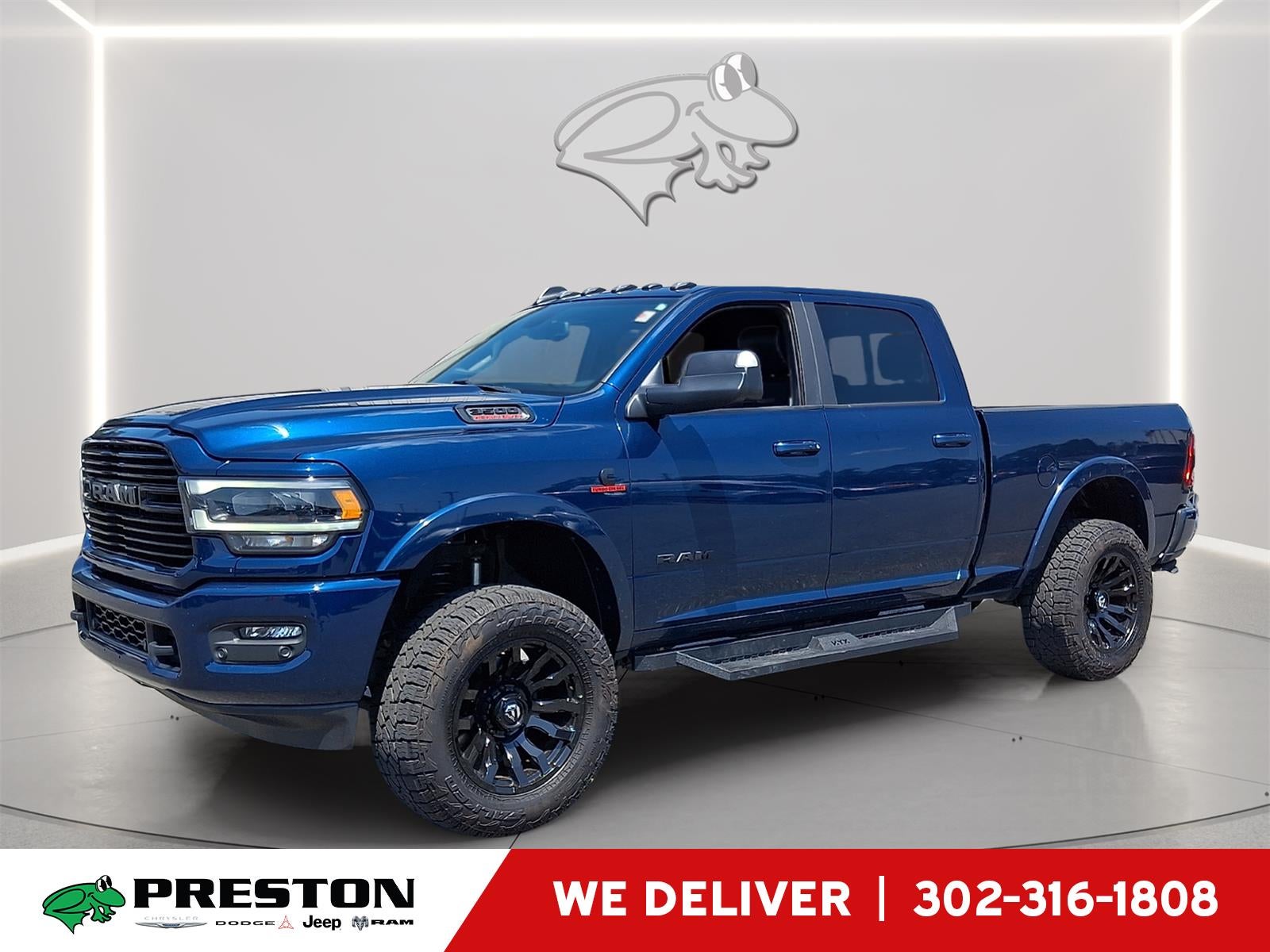 2021 RAM 3500 Laramie in Patriot Blue Pearlcoat — front three-quarter view